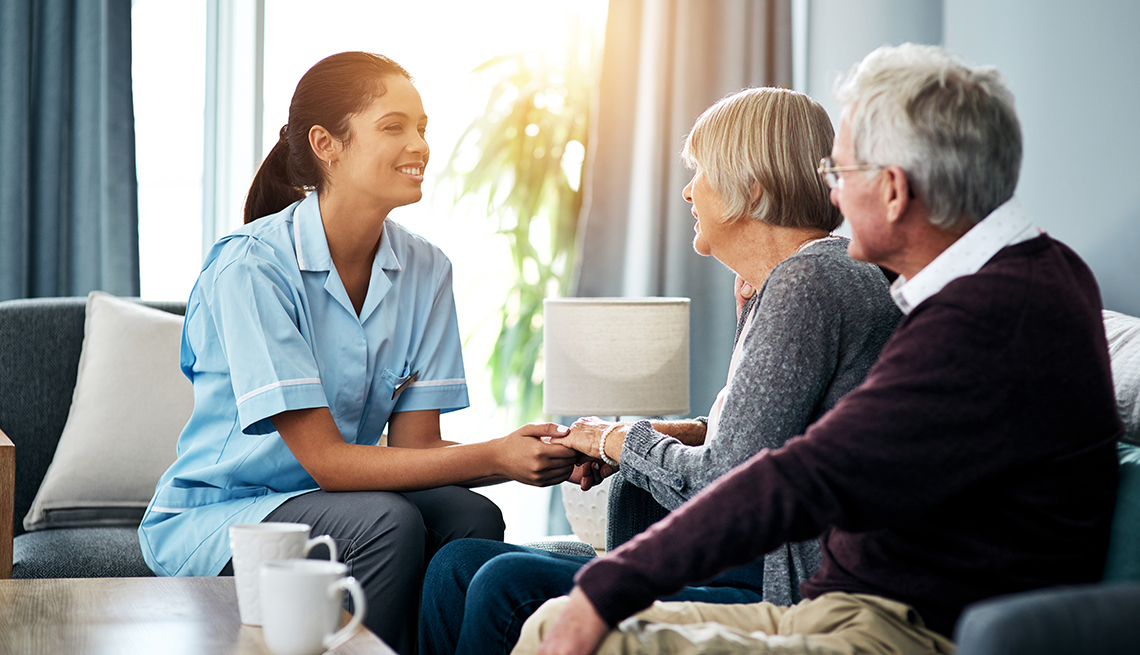 Expert Care nurse with elderly couple